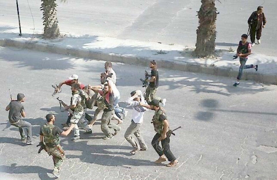 MAKTKAMP: I Syria slåss Assad-vennlige alawitter mot sunnimuslimske opprørere. FOTO: EMIN OZMEN/NTB SCANPIX