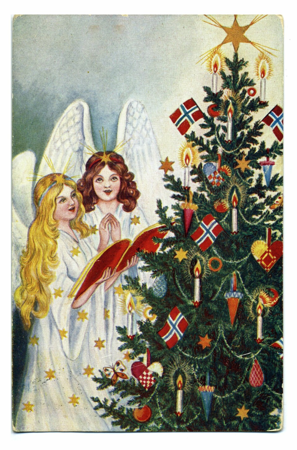Et julekort fra 1914. Hvilket land kommer juletretradisjonen fra? Et julekort fra 1914. Hvilket land kommer skikken fra?