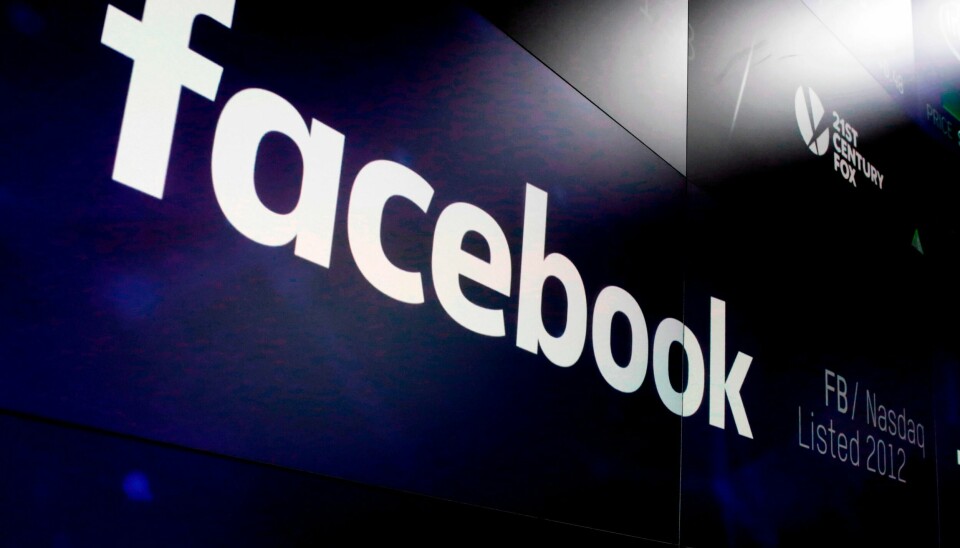 FILE - In this March 29, 2018, file photo, the logo for Facebook appears on screens at the Nasdaq MarketSite in New York's Times Square. Ireland's data regulator has launched an investigation of Facebook over a recent data breach that allowed hackers access 50 million accounts which could potentially cost Facebook more than $1.6 billion in fines. The Irish Data Protection Commission said Wednesday, Oct. 3, 2018 that it will look into whether the U.S. social media company complied with European regulations that went into effect earlier this year covering data protection. Facebook didn't immediately return a request for comment. (AP Photo/Richard Drew, File)