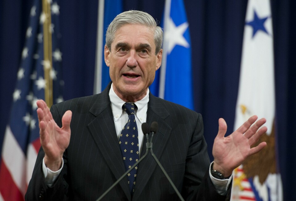 (FILES) In this file photo taken on August 1, 2013, former Federal Bureau of Investigation (FBI) Director Robert Mueller speaks during a farewell ceremony in Mueller's honor at the Department of Justice. - Donald Trump ripped into the Russia collusion probe November 7, 2018, calling it a 'disgusting Witch Hunt' as the end of a two-month election hiatus freed Special Counsel Robert Mueller to resume issuing indictments and pressing for the president himself to answer questions. The end of a Justice Department quiet period for the probe was expected to open the door for Trump's nemesis to resume filing charges and issuing subpoenas, with the president widely believed under investigation for possible obstruction of justice. (Photo by Saul LOEB / AFP) (FILES) In this file photo taken on August 1, 2013, former Federal Bureau of Investigation (FBI) Director Robert Mueller speaks during a farewell ceremony in Mueller's honor at the Department of Justice. - Donald Trump ripped into the Russia collusion probe November 7, 2018, calling it a 'disgusting Witch Hunt' as the end of a two-month election hiatus freed Special Counsel Robert Mueller to resume issuing indictments and pressing for the president himself to answer questions. The end of a Justice Department quiet period for the probe was expected to open the door for Trump's nemesis to resume filing charges and issuing subpoenas, with the president widely believed under investigation for possible obstruction of justice. (Photo by Saul LOEB / AFP)