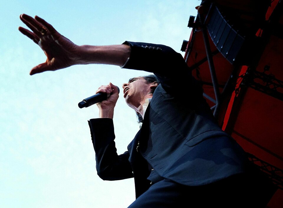 Nick Cave lar sorgen bli styrken når han nå utgir et nytt dobbeltalbum, «Ghosteen», som ikke minst handler om tap og sorg. Her fra Roskilde-festivalen i 2018, som en del av det som ble hetende «Distant Sky»-turneen.