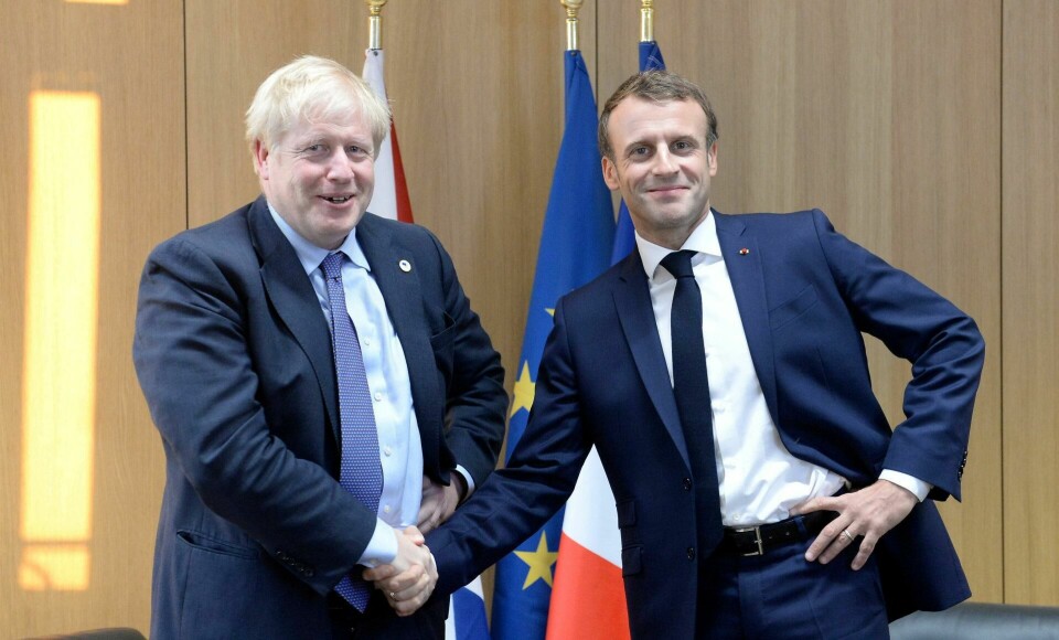 En fornøyd Boris Johnson i Brussel. Her med Frankrikes president Emmanuel Macron. FOTO: NTB SCANPIX En fornøyd Boris Johnson i Brussel. Her med Frankrikes president Emmanuel Macron. FOTO: NTB SCANPIX