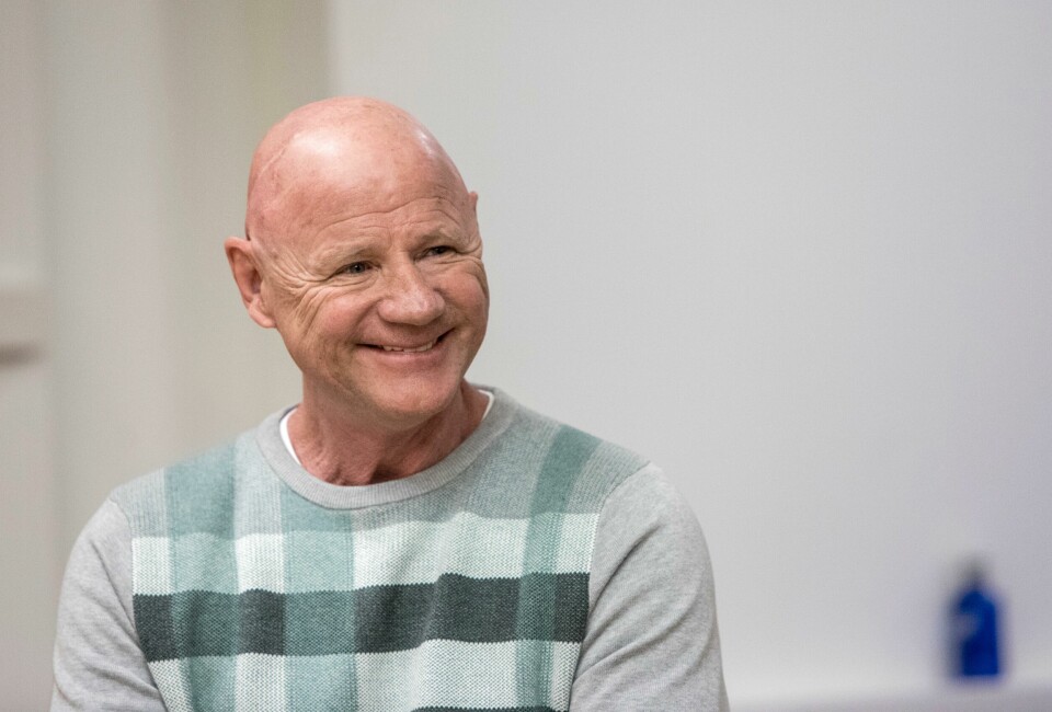 Jan Erik «Jannik» Iversen smilte til fotografene under rettssaken der han var tiltalt for å forsøkte å presse Kjell Inge Røkke for et tosifret millionbeløp. Oslo 20191009. Jan Erik «Jannik» Iversen står tiltalt for å forsøkte å presse Kjell Inge Røkke for et tosifret millionbeløp. Rettsaken går i Oslo tingrett.Foto: Ole Berg-Rusten / NTB scanpix