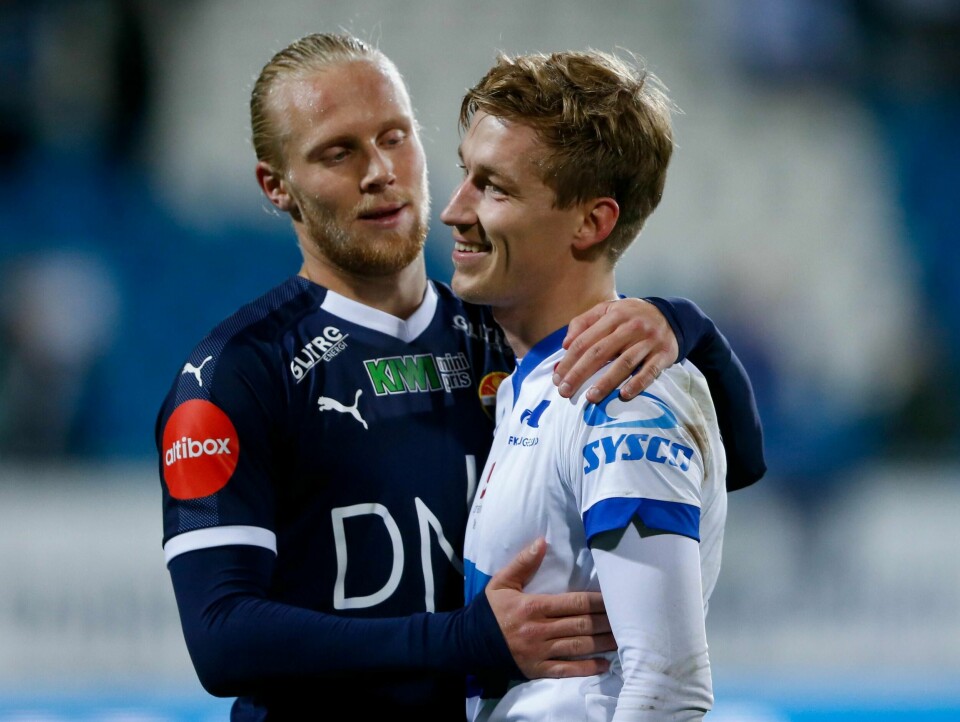Strømsgodsets Lars-Jørgen Salvesen og Haugesunds Niklas Sandberg (t.h) etter kampslutt. Eliteseriekampen i fotball mellom FK Haugesund og Strømsgodset på Haugesund stadion.