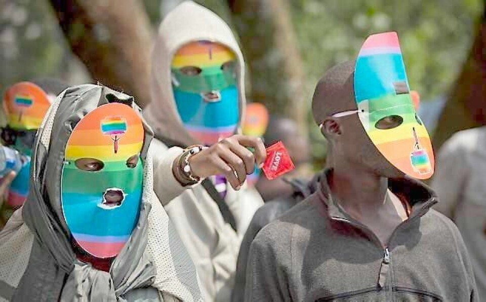 Homofile og lesbiske protesterer mot Ugandas antihomolover. Seksuelt samkvem mellom homofile er forbudt i 38 land i Afrika. FOTO: BEN CURTIS/NTB SCANPIX