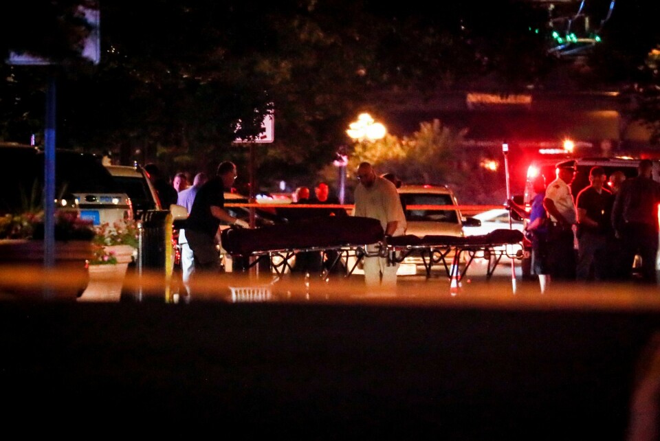 Bodies are removed from at the scene of a mass shooting, Sunday, Aug. 4, 2019, in Dayton, Ohio. Several people in Ohio have been killed in the second mass shooting in the U.S. in less than 24 hours, and the suspected shooter is also deceased, police said. (AP Photo/John Minchillo) Bodies are removed from at the scene of a mass shooting, Sunday, Aug. 4, 2019, in Dayton, Ohio. Several people in Ohio have been killed in the second mass shooting in the U.S. in less than 24 hours, and the suspected shooter is also deceased, police said. (AP Photo/John Minchillo)