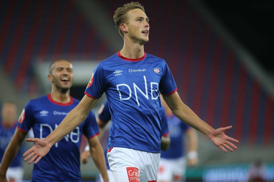Vålerengas Magnus Grødem jubler etter 2-0 scoringen under eliteseriekampen i fotball mellom Vålerenga og Tromsø på Intility Arena. Foto: Geir Olsen / NTB scanpix