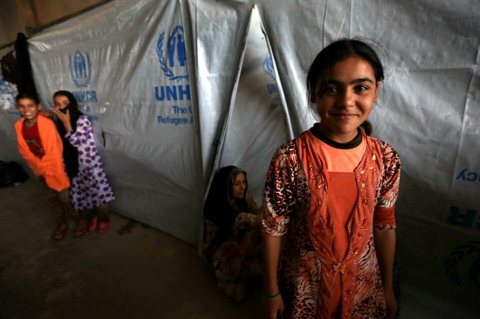 FLYKTNINGER: Disse unge irakerne holdt i 2014 til i flyktningleiren Bahrka, i Kurdistan-regionen i Irak.FOTO: SAFIN HAMED/NTB SCANPIX