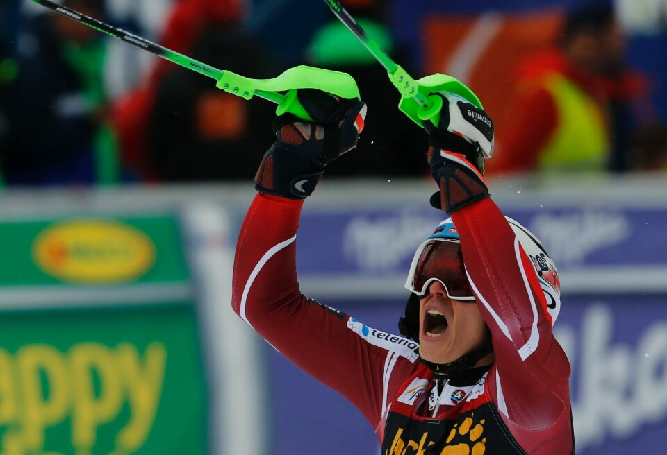 Henrik Kristoffersen skjønner at han har sikret seg totalseieren. FOTO: NTB SCANPIX
