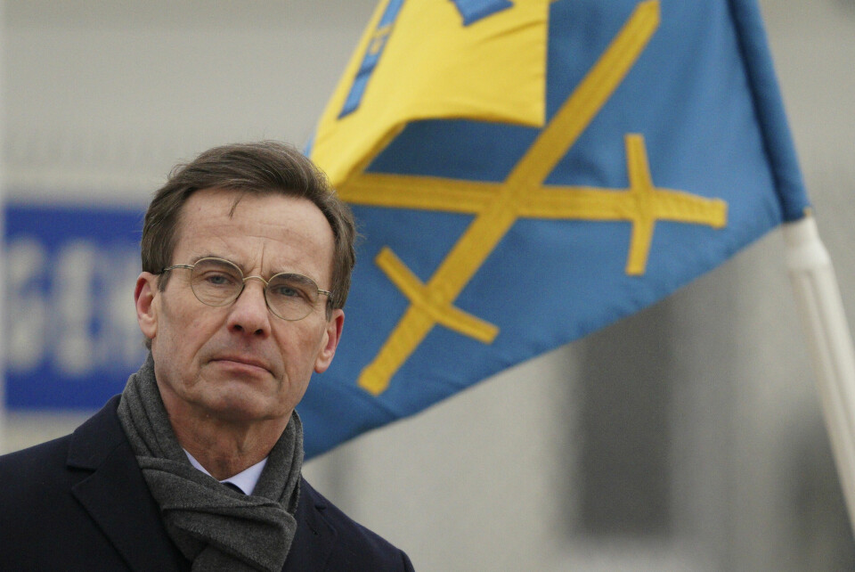 Sveriges statsminister Ulf Kristersson holder søndag en tale til nasjonen. Her er han fotografert på en militærbase i Latvia fredag. Sveriges statsminister Ulf Kristersson holder søndag en tale til nasjonen. Her er han fotografert på en militærbase i Latvia fredag. Foto: Roman Koksarov / AP / NTB