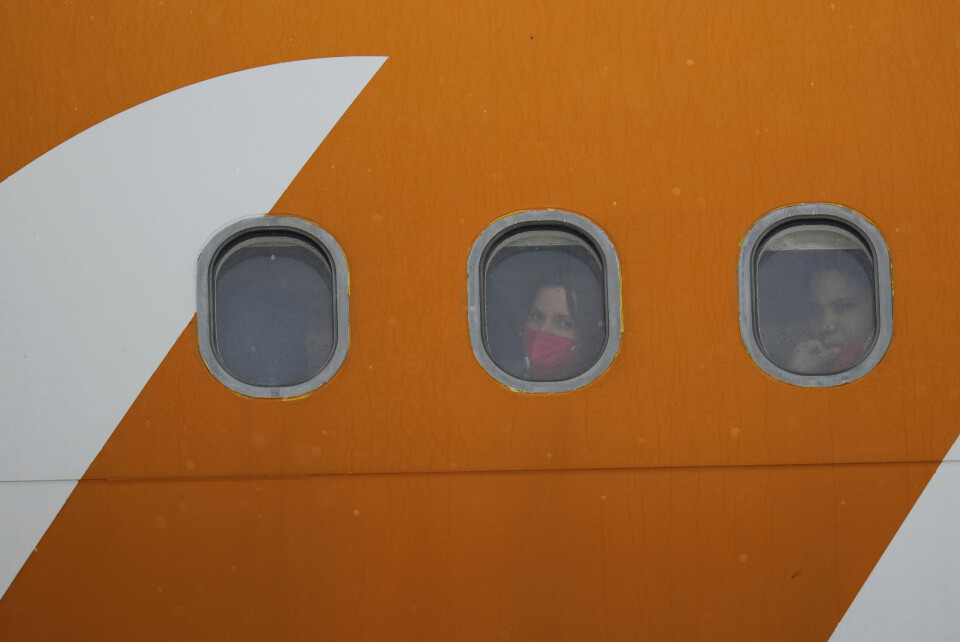 Innvandrere fra Venezuela om bord i et fly som har landet i Venezuela tidligere i mai, etter å ha blitt deportert fra USA. Innvandrere fra Venezuela om bord i et fly som har landet i Venezuela tidligere i mai, etter å ha blitt deportert fra USA. Foto: Ariana Cubillos / AP / NTB